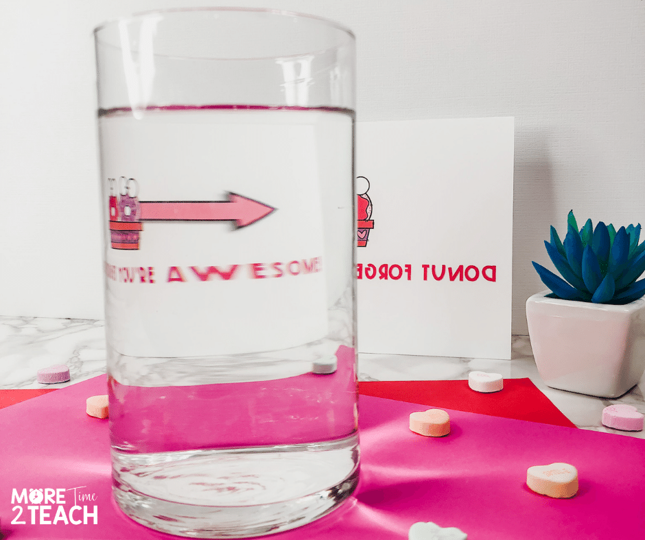 Try this simple light refraction experiment  perfect for Valentine's Day. Help kids see how light bending or refracting helps them read a secret Valentine message. Perfect for an easy science experiment!